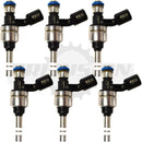 Side view of 6 genuine GM 12634126 fuel injectors with visible part numbers on black connector