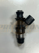 Right-side view of the 12568557 fuel injector showing the angled electrical connector and sealing rings