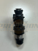 Top view of the 12568557 fuel injector showing the injector body, sealing rings, and printed identification markings