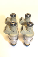 Set of 4 Genuine OEM 14LB 1985 - 1997 Ford Mercury Mazda 1.9L 2.3L Fuel Injectors